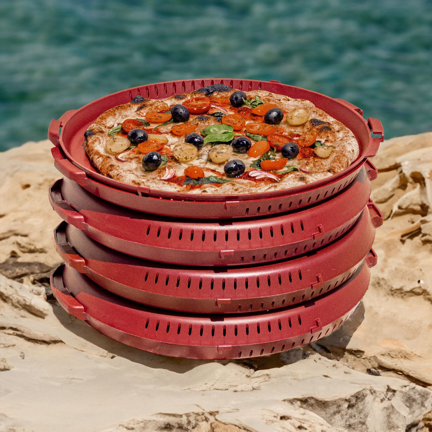 https://www.pizzycle.com/cdn/shop/files/PIZZycle_Bundle_reusable_pizza_container_zero_waste_pizza_box_Red-Wine_Stack_Pizza.jpg?v=1694635564